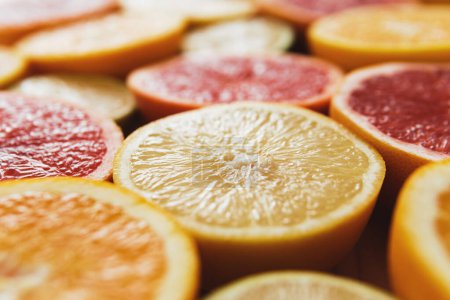 Photo for Closeup image of different sliced citrus fruits - Royalty Free Image