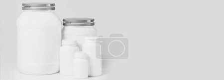 Foto de Burla de los frascos de complementos alimenticios blancos sobre fondo gris - Imagen libre de derechos