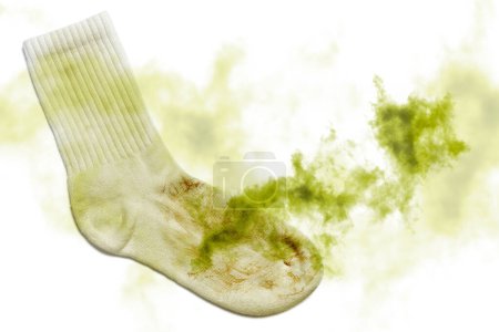 Foto de Primer plano de calcetín sucio maloliente sobre fondo blanco - Imagen libre de derechos