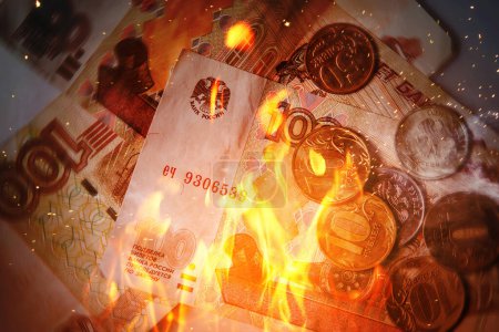 Background of burning russian rubles in fire flames