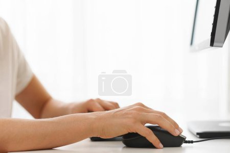 Photo for Closeup of female hands using computer pc on workplace in office - Royalty Free Image