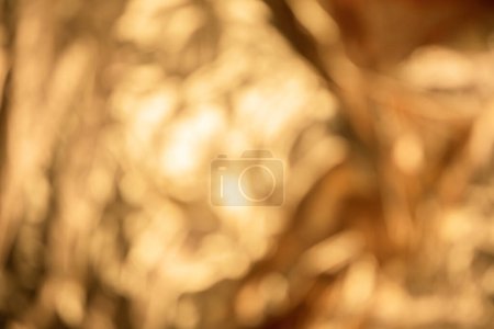 Photo for Closeup of abstract out of focus golden metallic background - Royalty Free Image