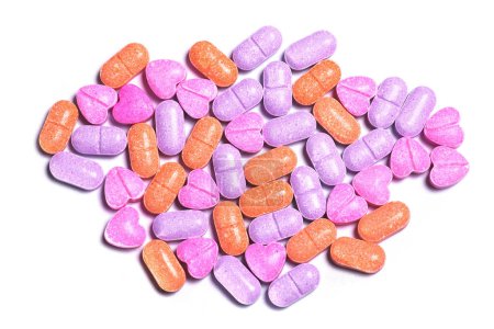 Photo for Closeup shot of a pile of colorful vitamin pills on white background. - Royalty Free Image