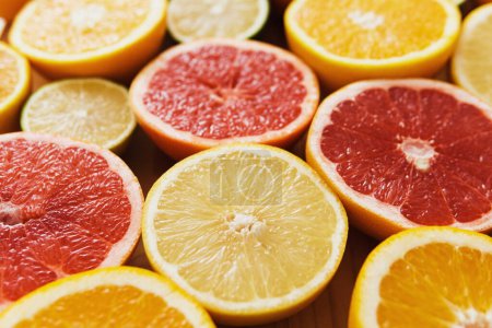 Photo for Closeup image of different sliced citrus fruits - Royalty Free Image