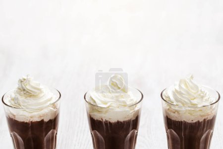 Photo for Glasses of delicious cold coffee with a whipped cream - Royalty Free Image