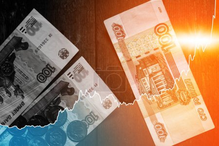 Téléchargez les photos : Graphique de la hausse des prix du rouble russe affectée par la croissance de l'économie - en image libre de droit