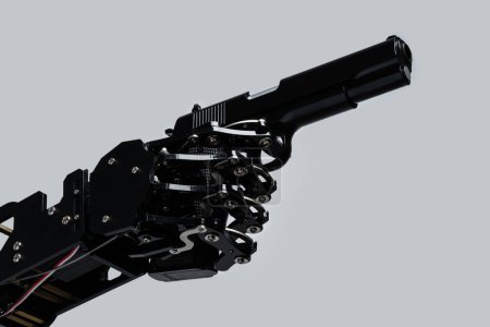 Téléchargez les photos : Une vraie main de robot avec une arme de poing. Concept de prise de contrôle de l'IA et singularité technologique. - en image libre de droit
