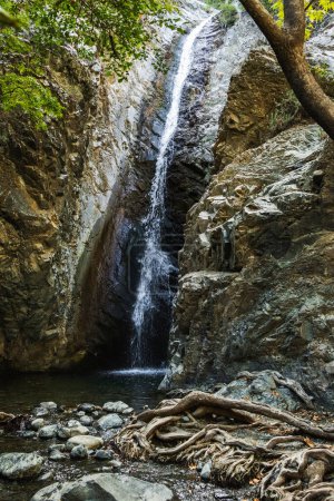 Photo for Hidden refreshing picturesque Cyprus waterfall in the mid-summer vacation - Royalty Free Image