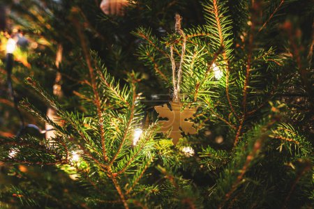 Photo for Close-up background of christmas tree with decorations and fairy lights - Royalty Free Image