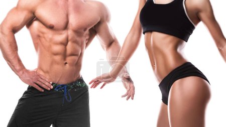 Photo for Fitness couple, both showcasing their muscular physiques against white background. - Royalty Free Image