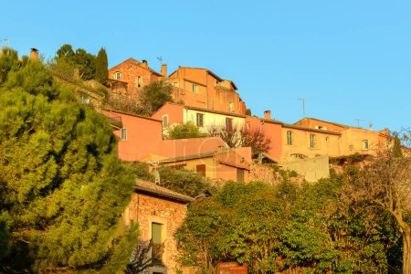 Photo for Famous ochre colored houses of Roussillon village in Provence countryside, France - Royalty Free Image