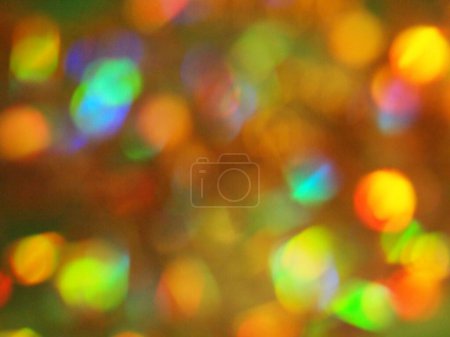 Foto de Fondo bokeh desenfoque abstracto en color marrón, azul, verde, amarillo y rojo. Fondo festivo bueno para fiesta de cumpleaños o Navidad. - Imagen libre de derechos