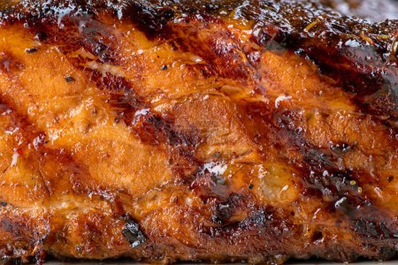 Photo for Texture of fried fillet glazed pork, close-up. Grilled Pork Rib. - Royalty Free Image