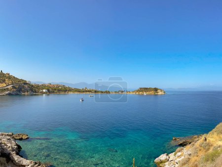 Photo for Kusadasi, Turkey - May 2022: Scenic landscape view of the bay of water in front of the town of Kusadasi - Royalty Free Image
