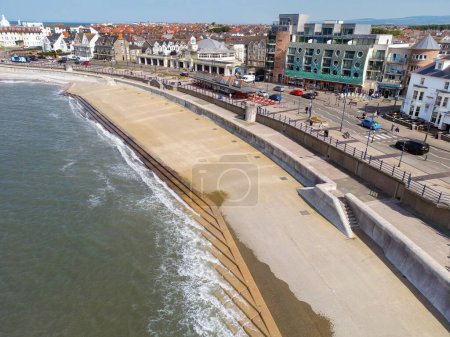 Photo for Porthcawl, Wales - 9 June 2023: Aerial view of the concrete platform in front of the promenade of the town of Porthcawl in south Wales. - Royalty Free Image