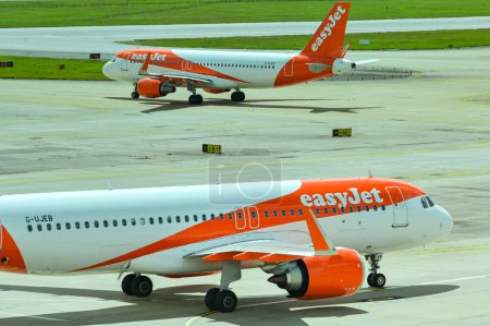 Photo for London, England, UK - 1 August 2023: Passenger planes operated by budget airline easyjet waiting to take off at London Gatwick airport - Royalty Free Image