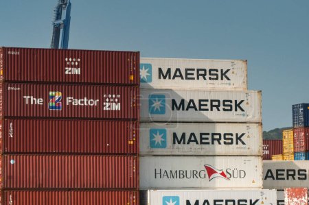 Photo for Panama City, Panama - 22 January 2024: Shipping containers ued by Maersk and ZIM stcked in the city's container port - Royalty Free Image