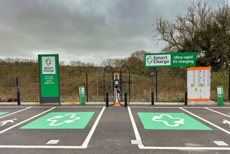 Photo for Pontyclun, Wales - 21 March 2024: Rapid charger point for electric vehicles ina supermarket car park. - Royalty Free Image