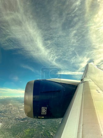 Photo for Rolls Royce turbofan jet engine on an airliner at cruising altitude - Royalty Free Image