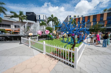 Photo for Doral, Florida - April 9, 2023 - Family Easter theme at Fountain Plaza in CityPlace Doral on sunny Sunday afternoon. - Royalty Free Image
