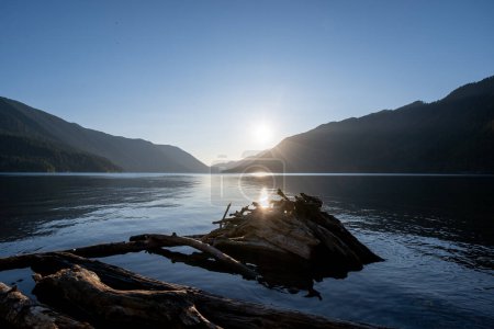 Calm clear summer sunset on Lake Crescent in Olympic National Park, Washington.