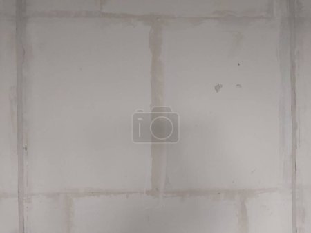 Foto de La textura de la masilla de pared en el nuevo apartamento - Imagen libre de derechos