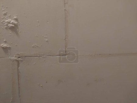 Foto de La textura de la masilla de pared en el nuevo apartamento - Imagen libre de derechos
