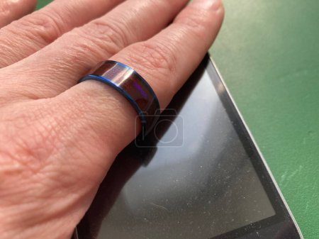 Photo for NFC ring sensor for storing and the transmitting information - Royalty Free Image