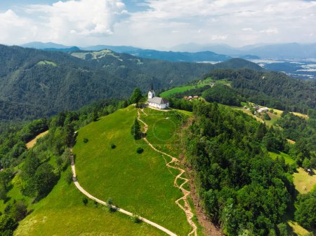Aerial View of Sveti Jakob Hill with a Church on Top. Slovenia, Europe
