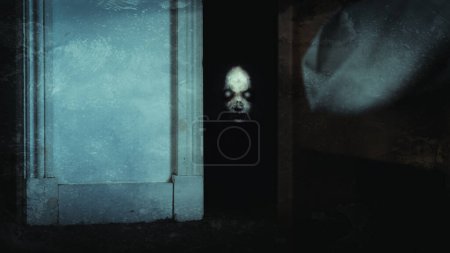 Foto de A horror concept of a demon with glowing eyes. Looking out from a bedroom cupboard. With a grunge edit - Imagen libre de derechos