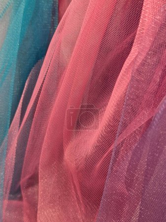 Thin cloth. Thin translucent colored fabric. Fabric background