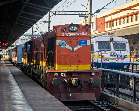 Photo for Ahmedabad, Gujrat, India-March 28th, 2023:Old and new diesel locomotives on adjacent railway lines. - Royalty Free Image