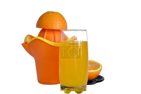 Photo for The picture shows orange juice in a tall glass, a manual juicer and a fruit orange. - Royalty Free Image
