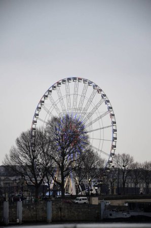 Photo for Paris, France 03.23.2017: The giant Ferris wheel (Grande Roue) is set up on Place de la Concorde - Royalty Free Image