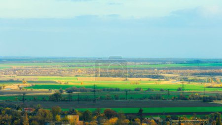 Téléchargez les photos : Ukrainian distant rural scenery landscape. The endless far away horizon view. At the daytime. On the cloudy sky background - en image libre de droit