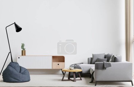 Foto de Gran salón blanco. Diseño de interiores, sofá gris, lámpara, mesa de madera, pared de alfombra para maqueta y espacio de copia - Imagen libre de derechos