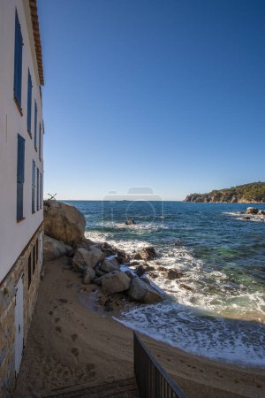 Beautiful seascape on the quiet waters of Mediterranean Sea shore in a beautiful beach in Costa Brava, Catalonia