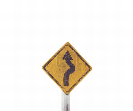 Photo for A photography of a yellow and black road sign with a curved curve, there is a yellow sign with a black arrow on it. - Royalty Free Image