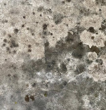 Photo for A photography of a dirty concrete wall with a bunch of small holes, concrete surface with a lot of small holes in it. - Royalty Free Image