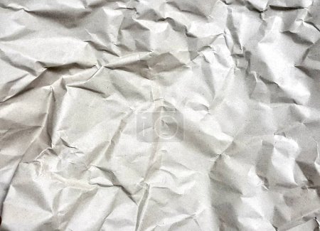 Photo for A photography of a piece of crumpled paper with a black background, wrinkled paper with a black background and a white background. - Royalty Free Image
