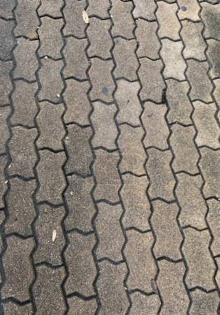 Photo for A close up of the sidewalk with a cobblestone pattern.. - Royalty Free Image