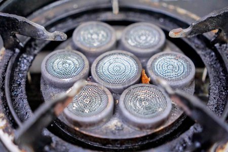 Photo for A close up of the circular panel of a gas stove. - Royalty Free Image