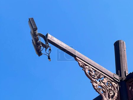 Photo for A photography of a street light with a blue sky in the background. - Royalty Free Image