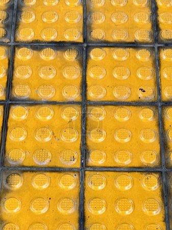 a photography of a yellow street light with a lot of yellow circles.