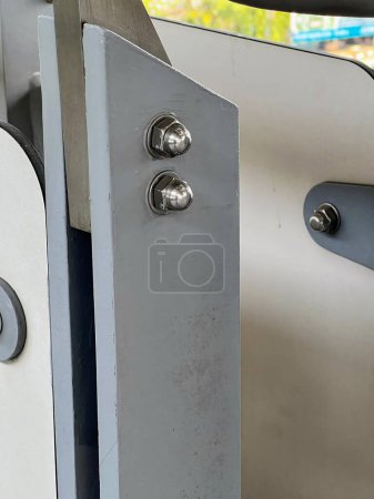 a photography of a close up of a door handle on a vehicle.