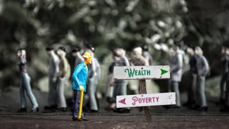 Straßenschild weist den Weg in Richtung Wohlstand versus Armut