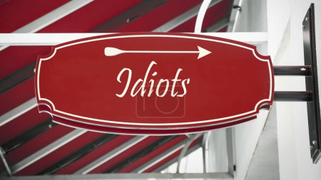 Photo for Street Sign the Direction Way to Idiots - Royalty Free Image