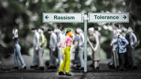 Photo for Street Sign the Direction Way to Tolerance versus Rassism - Royalty Free Image