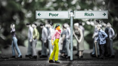 Photo for Street Sign the Direction Way to Rich versus Poor - Royalty Free Image
