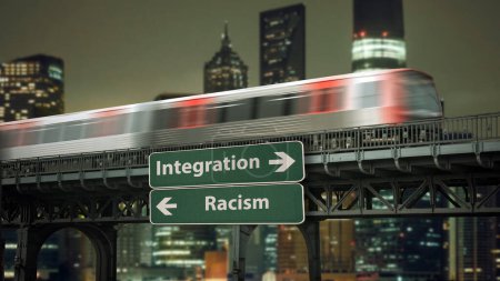 Photo for Street Sign the Direction Way to Integration versus Racism - Royalty Free Image